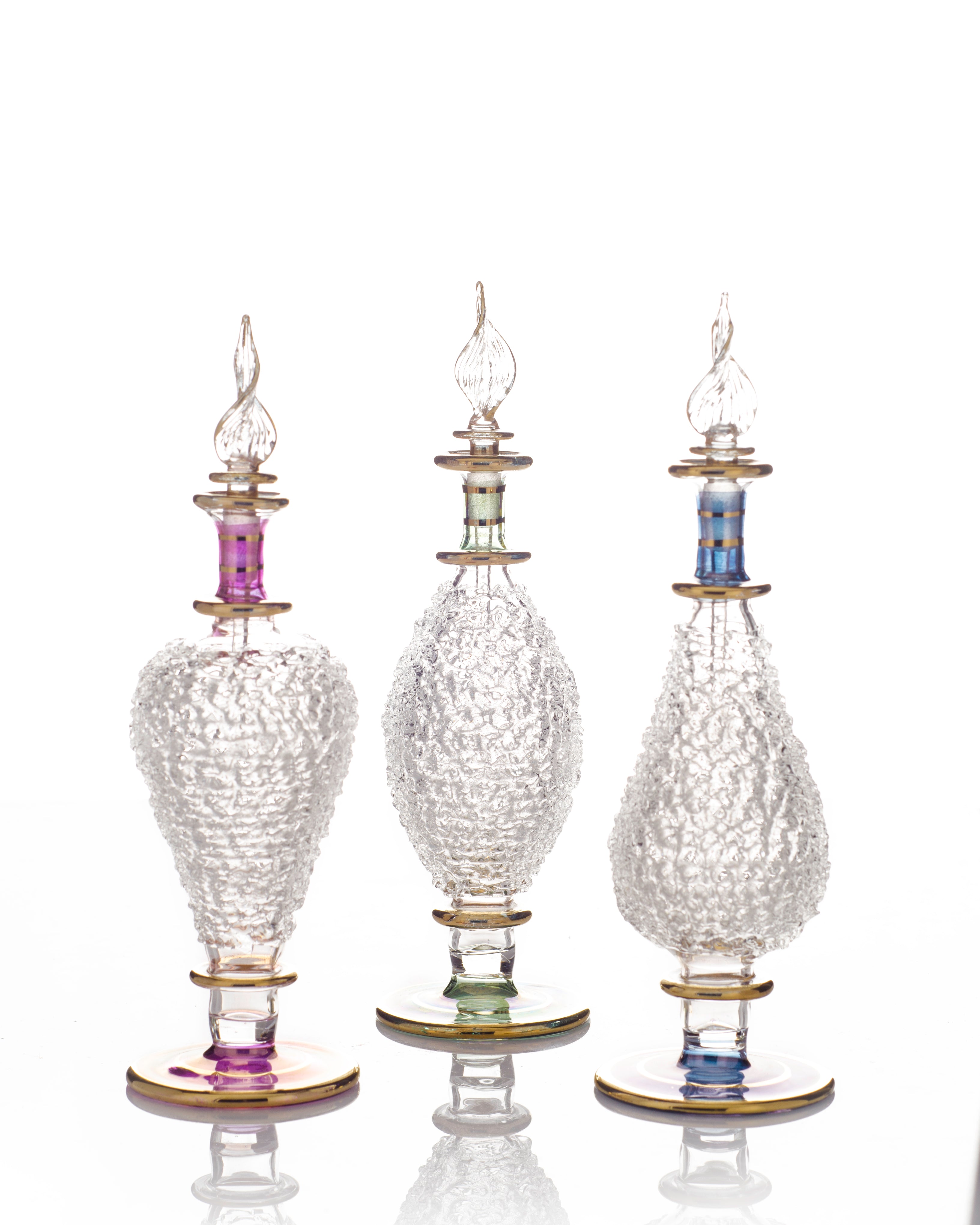 Frost-textured hand-blown glass perfume bottle with a flame-twist stopper and 24K gold rings — Mishkah Cairo